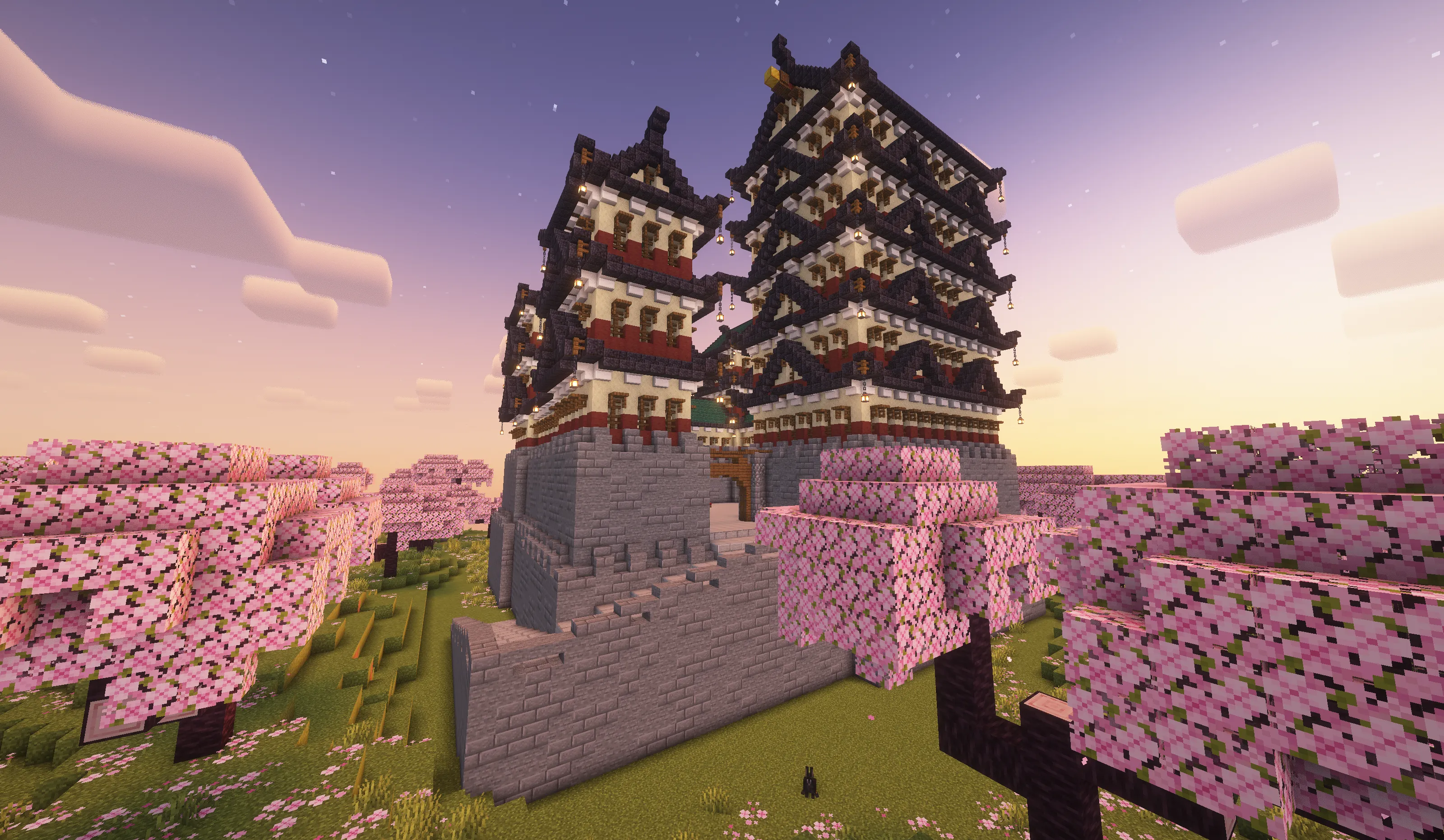 Asian style temple surrounded by cherry blossoms.