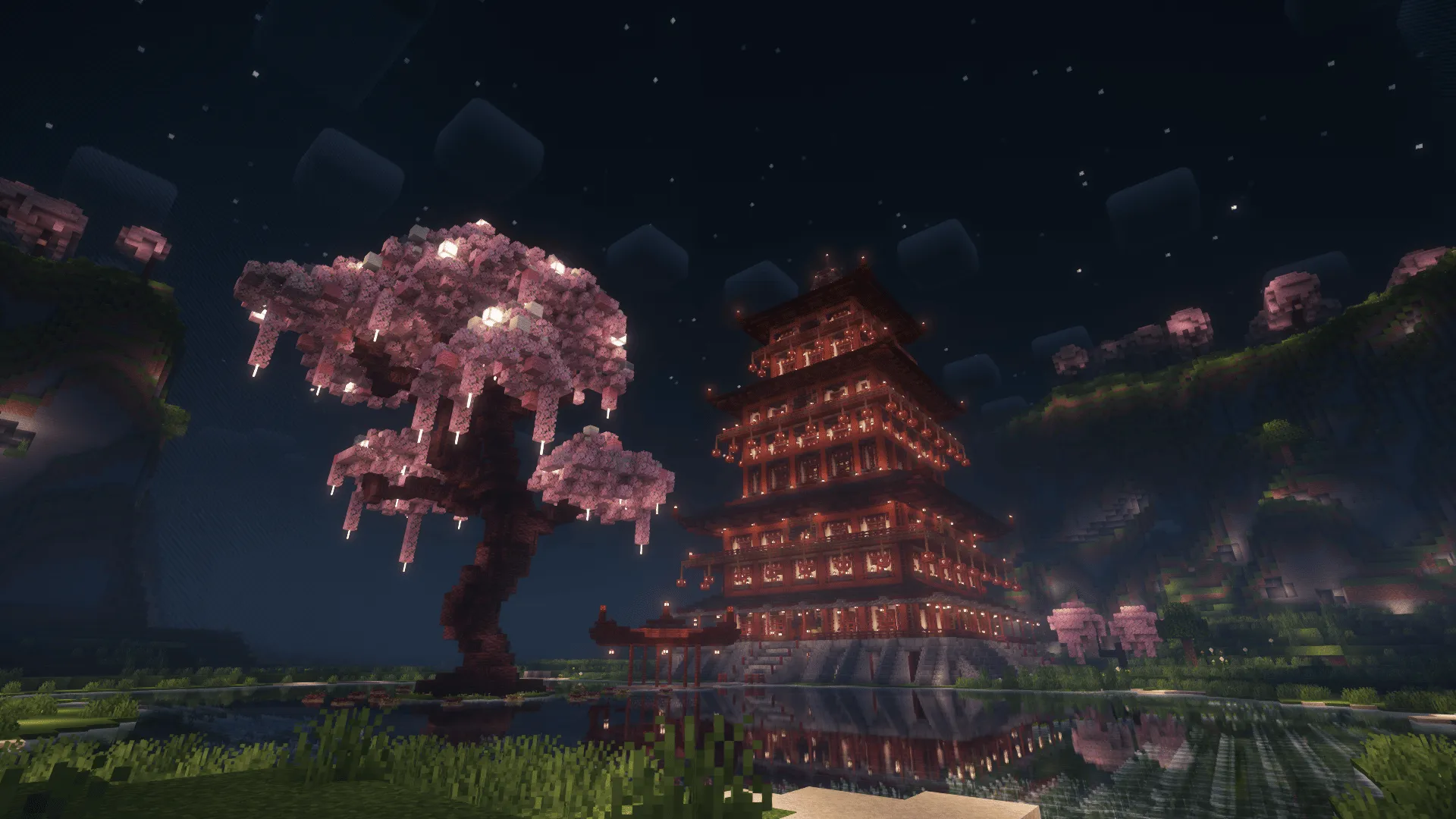 Japanese temple facing pond in cherry grove crater surrounded by cherry blossoms.